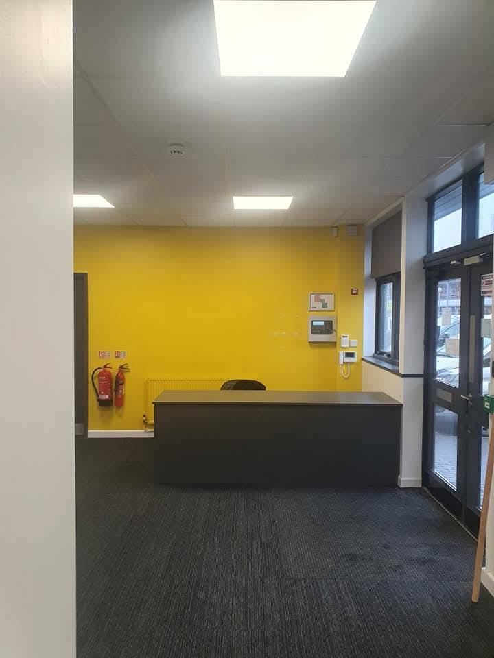 Reception area with feature wall lighting